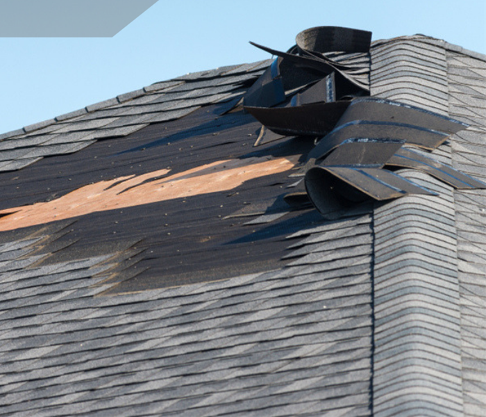 a roof with shingles missing